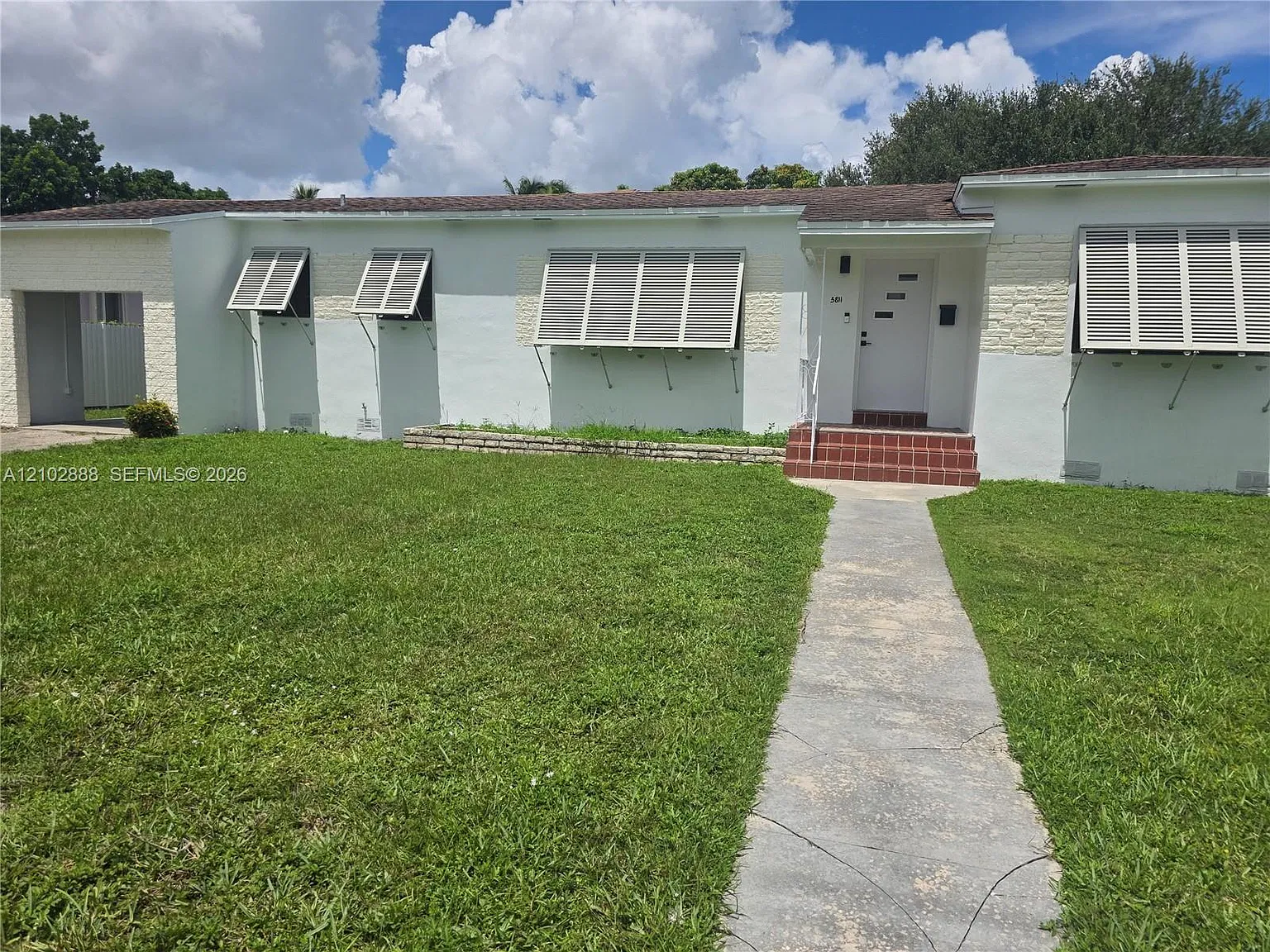 Tamiami Acres Plan 1 — Photo 1