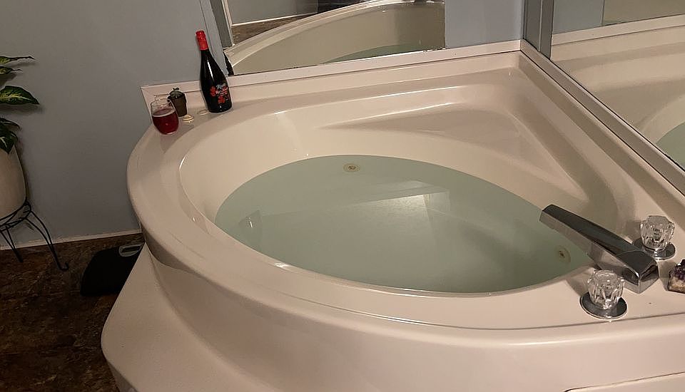Master bath with jetted tub