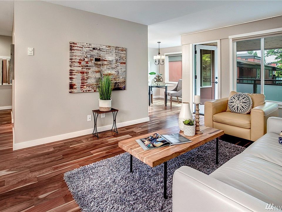 The bright and open living room awaits you 