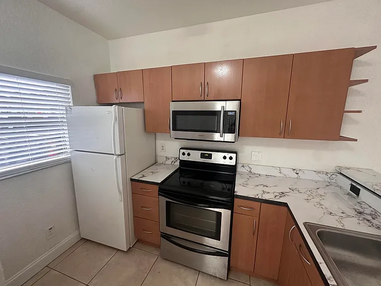 3590 NW 91st Ln #3590 — Photo 2