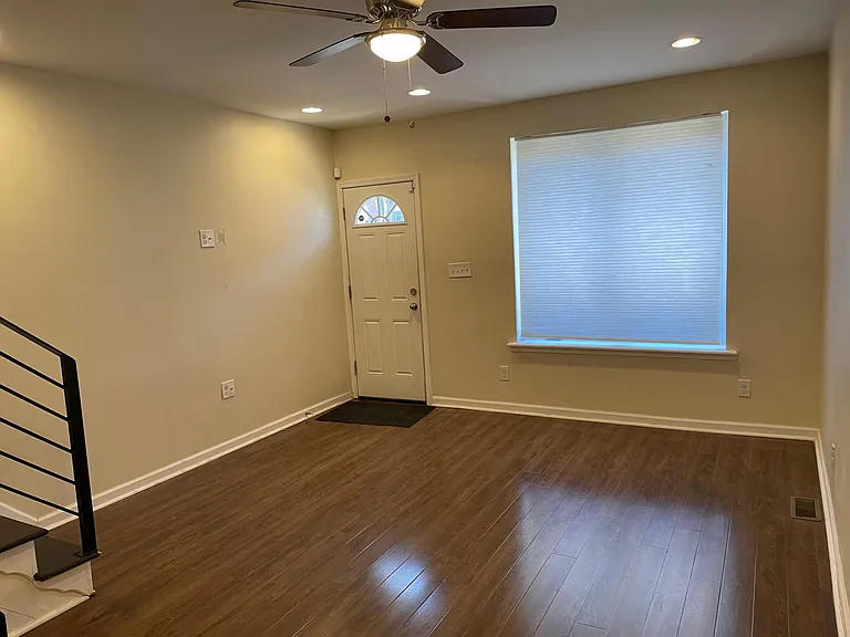 Living room looking to front of house