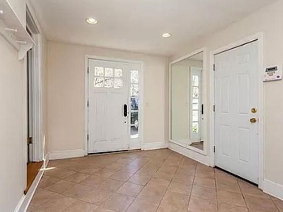 Four Seasons Room- garage entry door on right