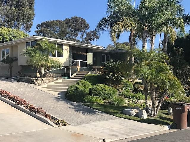 Front of house and driveway - front deck and access to front door