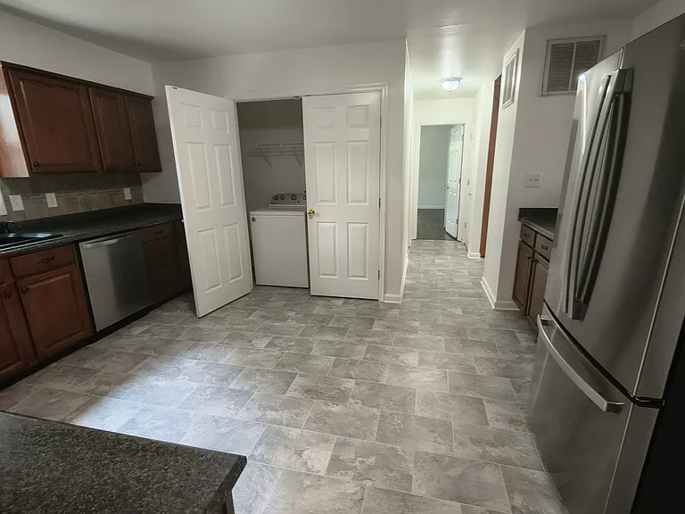 Kitchen - Washer + Dryer in closet