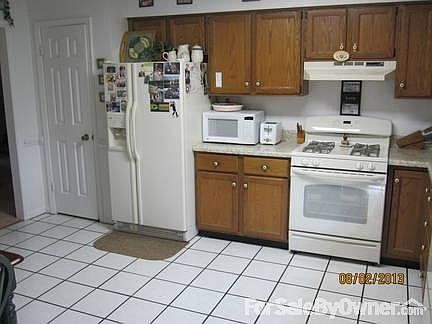 Kitchen
						:
						Refrigerator 5 years old