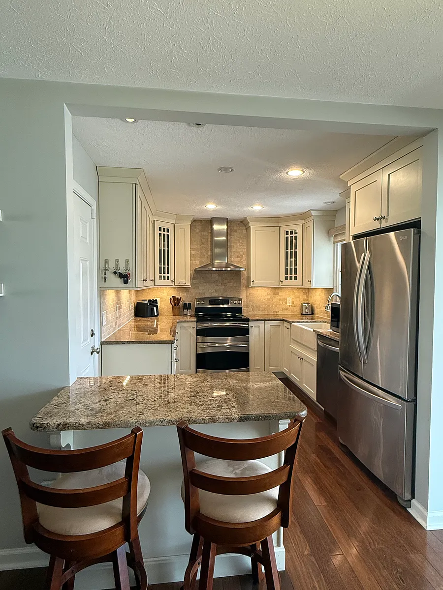 Completely remodeled, custom kitchen. Matching stainless LG appliances, double oven, granite counter tops, tile back splash, cast iron farmhouse sink. - 7109 Hurst Ln