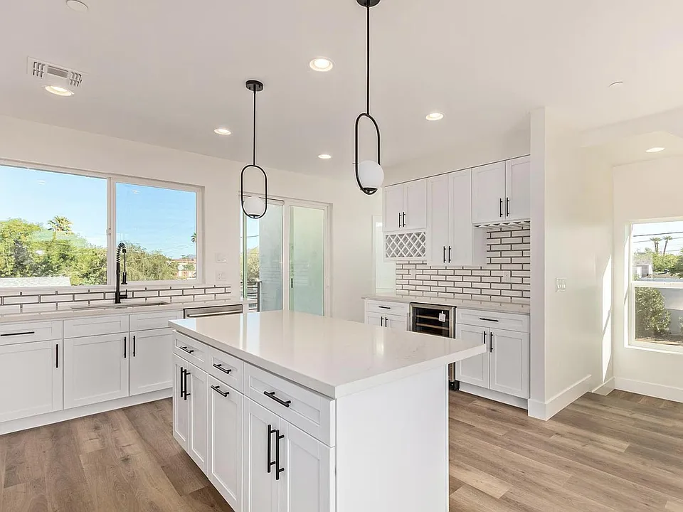 Gourmet kitchen with wine bar, large island and upgraded appliances