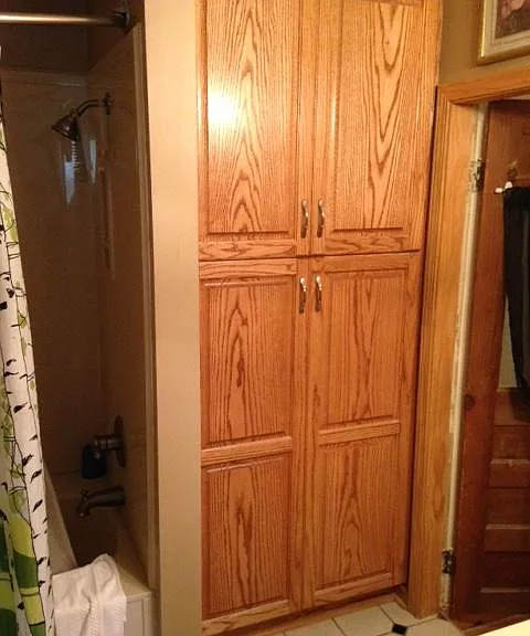 large storage in bathroom. one just like it in kitchen