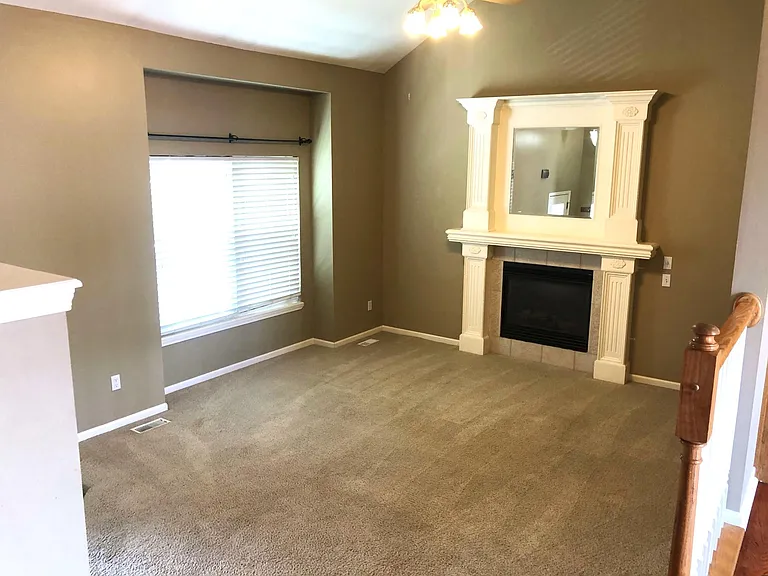 Living Room, vaulted ceiling, decorative fireplace