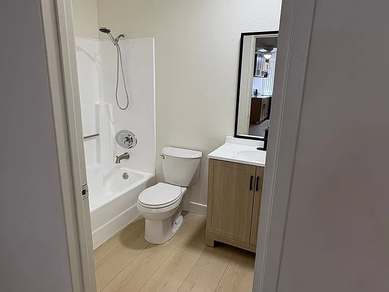 WOD - Woodman Apartments — Photo 8