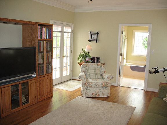 Another view from the master on main showing the bath & doors to pool.