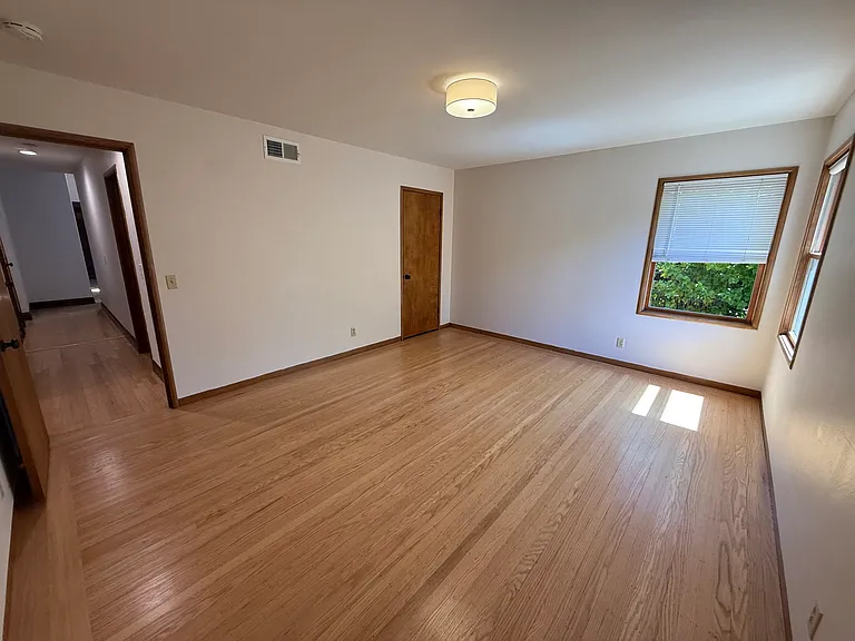 Bedroom #1 has 2 windows and 2 closets.