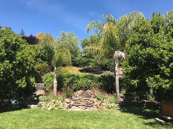 Park-like backyard maintenance included