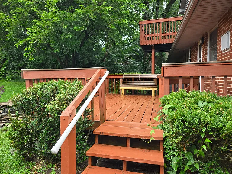 Large deck off kitchen and upstairs deck off master bedroom