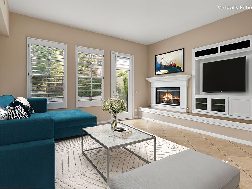 Family room with fireplace and built-in media niche