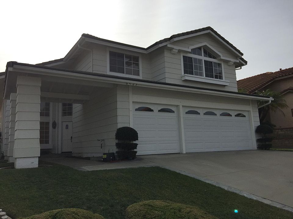 Front door and 3-car garage