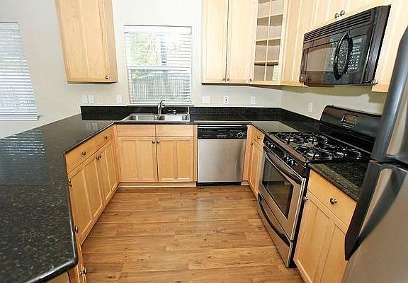 Kitchen with Granite Countertops & Stainless Steel Appliances