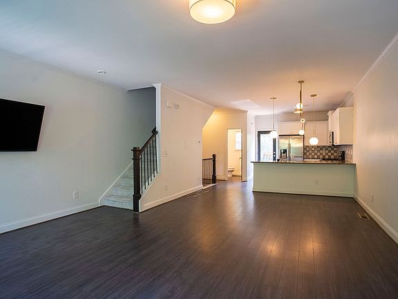 Living room facing kitchen