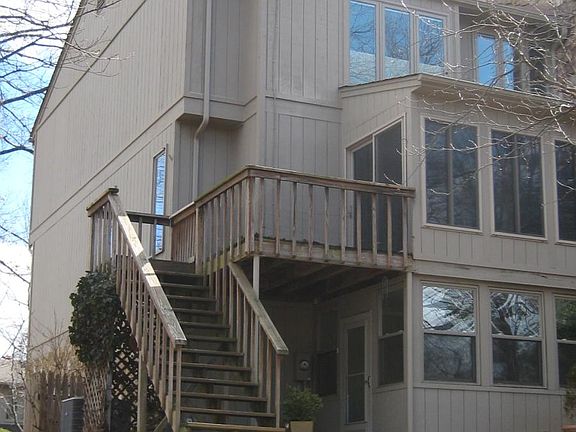Rear showing enclosed patio and sun room