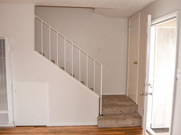 Townhome with gas wall furnace on 1st floor