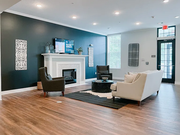 Experience relaxation in this chic lounge, designed for modern comfort and style.