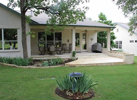 Stone porch and extended stone patio for year round enjoyment.