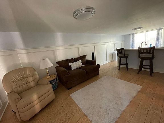 Living room Kitchen Combo Overlooking Personal Courtyard