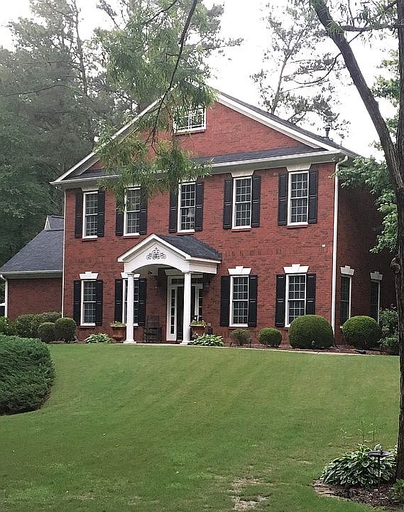 Creek runs cross the front