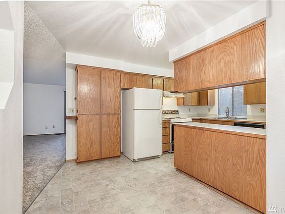 The home features brand-new flooring throughout.  The kitchen is nicely accessible and well laid out.
