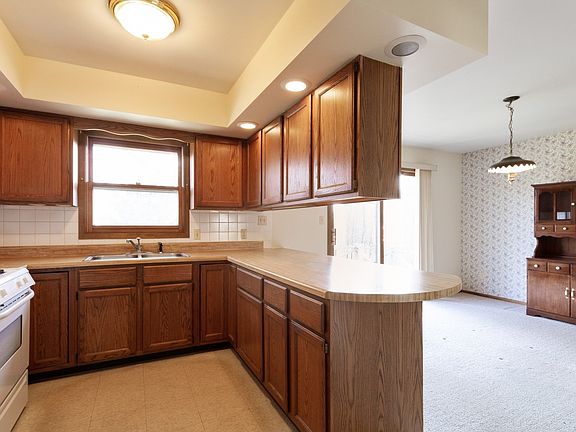 Open Kitchen to the Dining Room area.  Great for entertaining.  Plenty of cabinets and counter space.