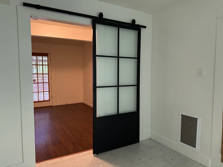 Sliding door to office, add'l room.