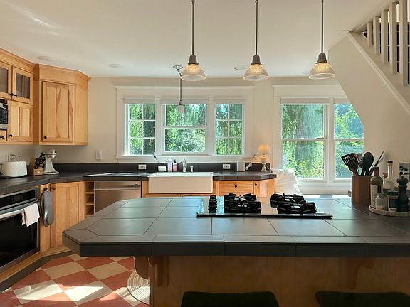 Eastern-facing windows welcome the bright morning light.