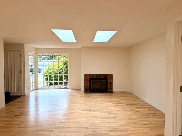 Living room looking out the front yard