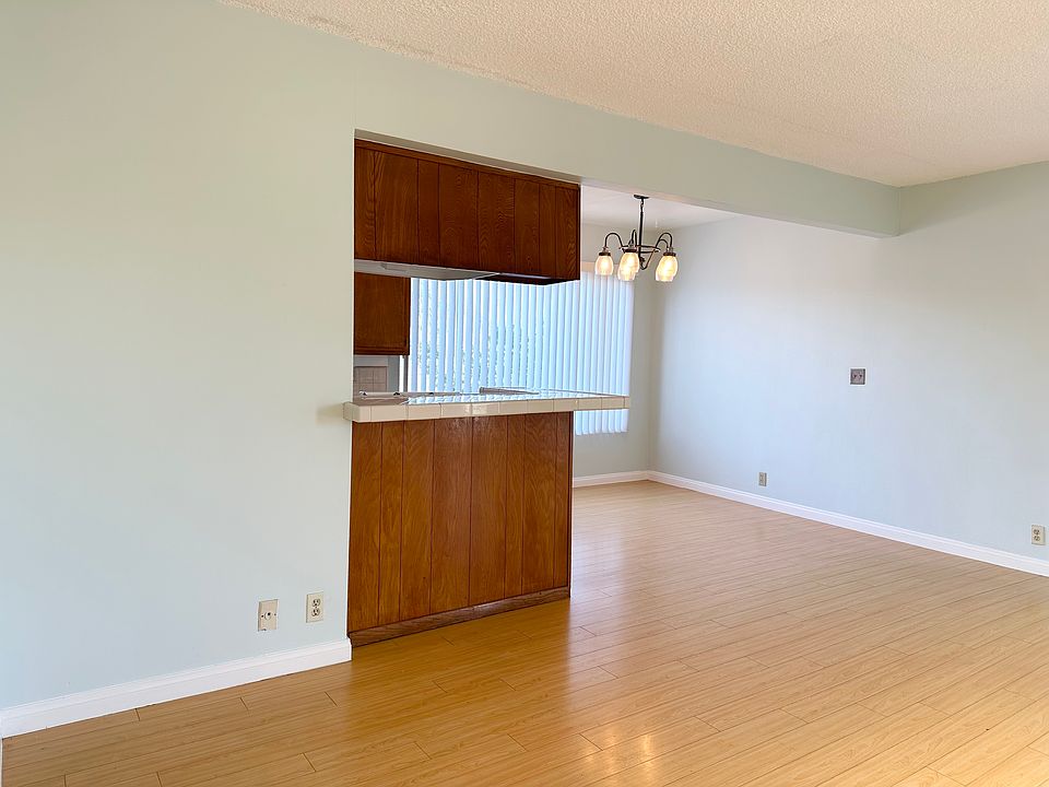 Livingroom looking into dining room and kitchen