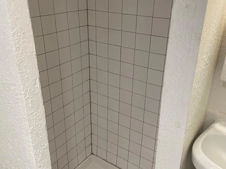 Bathroom looking right to left photo #2.
