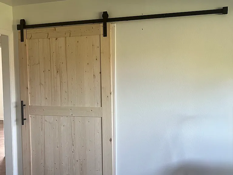Barn door for privacy to living room / second bedroom