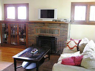 Wood burning fireplace, built-ins and beautiful hard wood floors.
