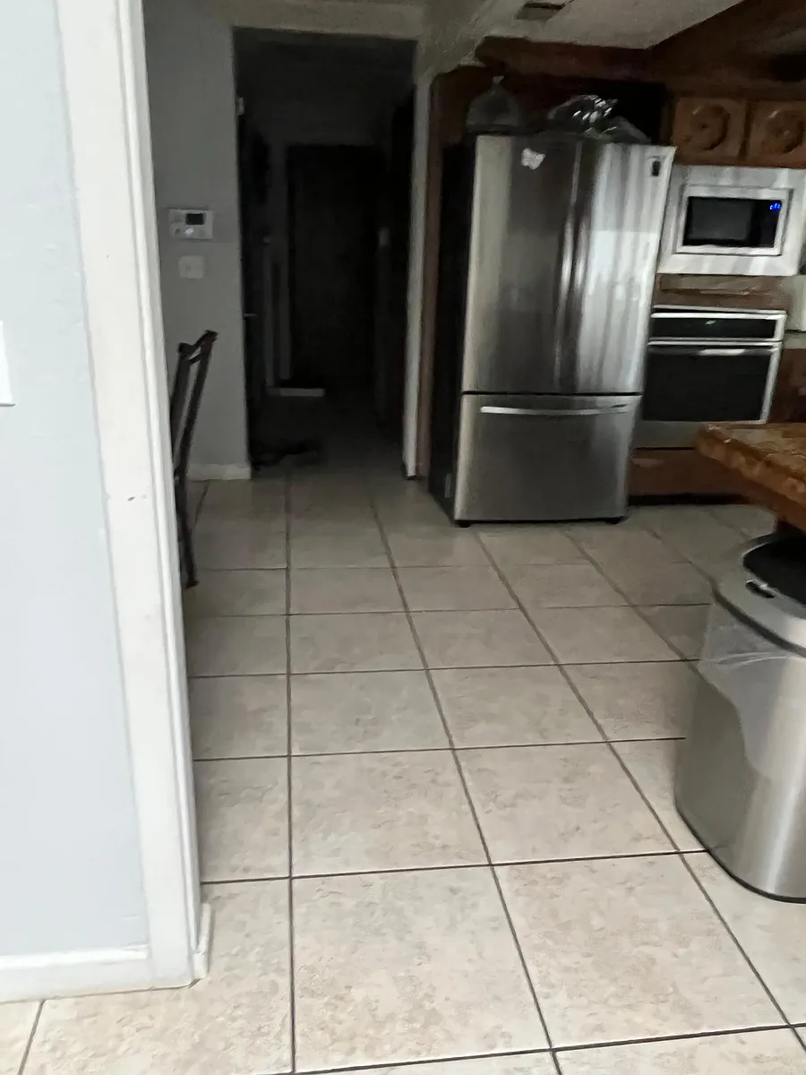 Another photo of kitchen taken in family room - 1220 W Alluvial Ave