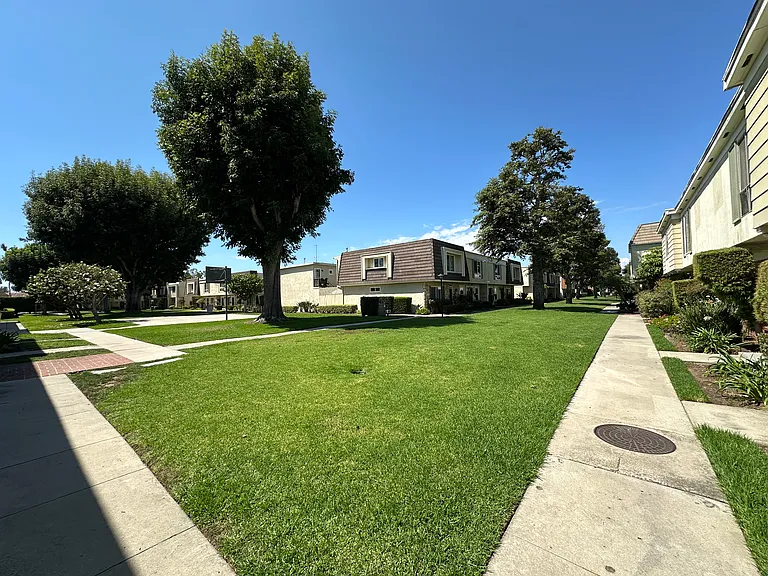 Green space in front of townhome.