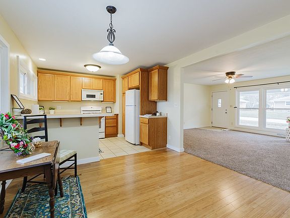 Plenty of room for a table & chairs, but wouldn't a built-in nook here be fabulous with storage in t