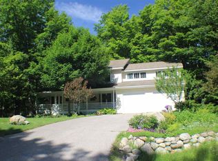 9065 N Pointe Woods Dr, Charlevoix, MI 49720