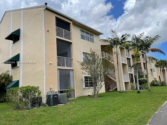15325 SW 106th Ter #618 — Photo 1