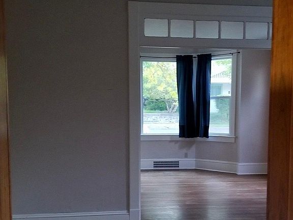 Looking south from kitchen to dining and living rooms.