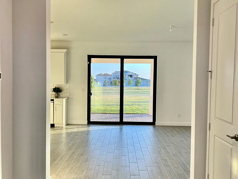 ENTRY TO FAMILY ROOM AND KITCHEN