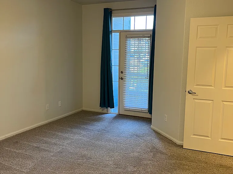 Master bedroom facing private porch.