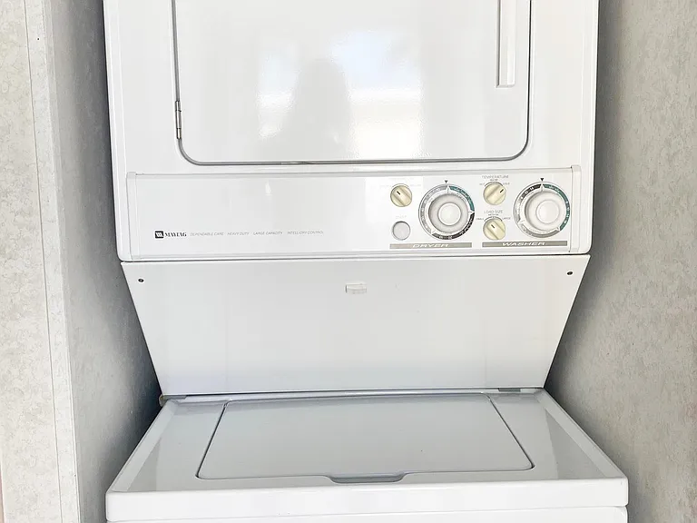 A small nook contains your washer and dryer making laundry a breeze.