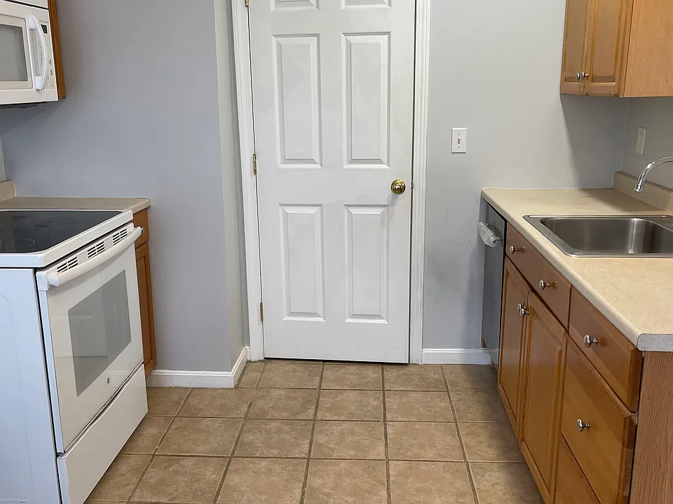 Kitchen with brand new dishwasher