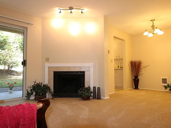 Living & Dining Room with wood burning fireplace