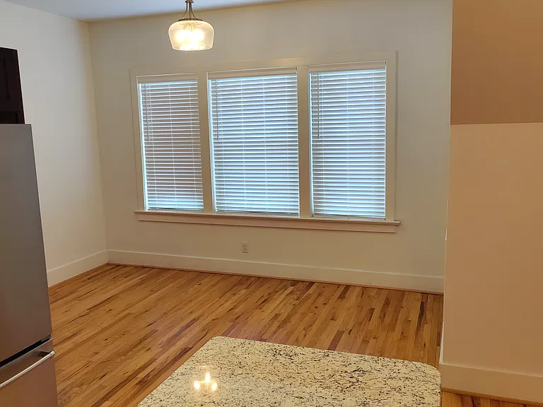 More of the dining room areas as seen from the kitchen island.