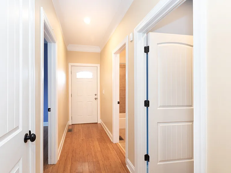 Hallway to Bedrooms 3,4 & Deck